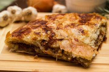 Savoury slice of pie with meat