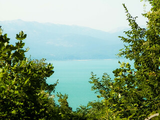 Fototapeta na wymiar View on coast of Lake Prespa and Mountains of Galicica National Park, Macedonia