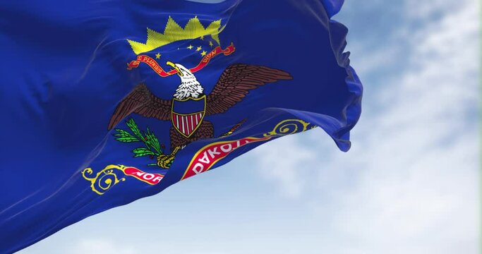 Close-up view of the North Dakota state flag waving