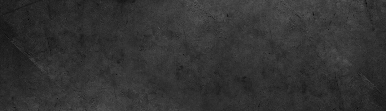 Close-up of dark grey concrete wall texture background
