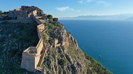 Aerial drone photo of iconic fortress of Palamidi built uphill overlooking old city of Nafplio well...