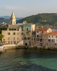 The scenographic village of Saint Florent (San Fiorenzo) on a summer afternoon, in Corse, France.