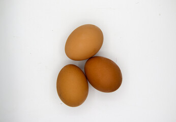 Raw egg on a white background