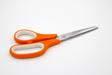 Scissors on the white background