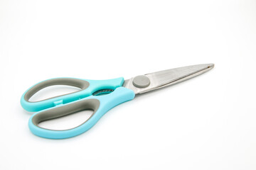 Scissors on the white background