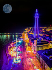 An aerial view of the illuminations at Blackpool under a full moon in Lancashire, UK