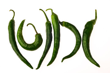 six green chili pepper isolated on white background