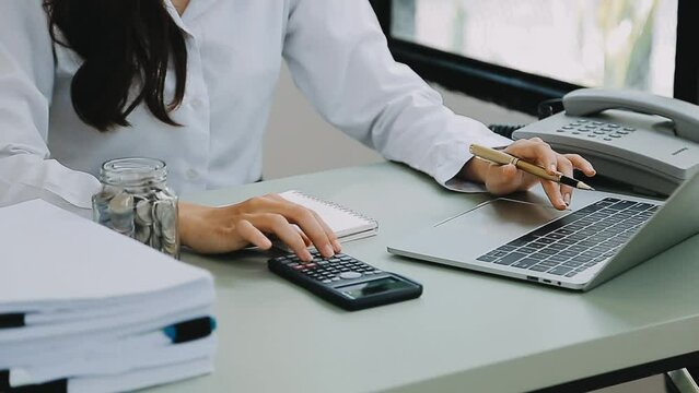 Businessman working with smart phone and laptop and digital tablet computer in office with digital marketing media in virtual icon	