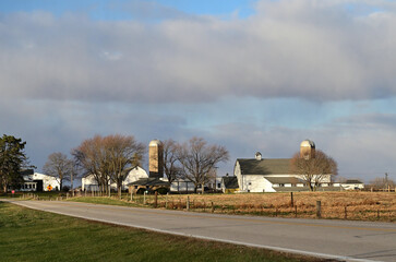 Obraz na płótnie Canvas Barns on a dairy farm in northeastern Illinois. While dairy farming is more closely associated with Illinois' northern neighbor Wisconsin a fair number of dairy farms dot this area's landscape.