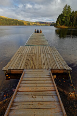 On a wooden pontoon on the shores of the Lake Wapizagonke, La Mauricie National Park, Quebec, Canada