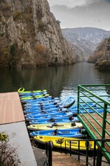row of boats on a pier at the nature reserve Matka canyon in Macedonia