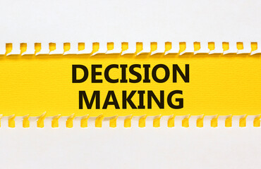 Decision making symbol. Concept words Decision making on yellow paper. Beautiful white background. Business and decision making concept. Copy space.