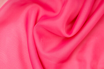 pink silk. wavy fabric. abstract background for design