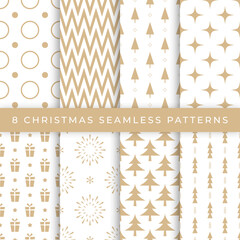 Set of gold or beige Christmas and New Year vector seamless patterns. Global colors, easy to edit. Stock design illustration - 548845409