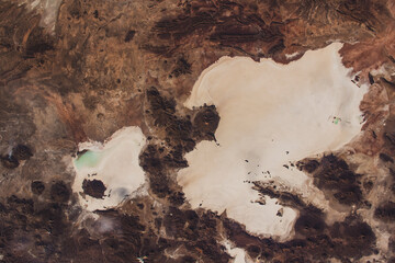 Aerial view of Uyuni Salt Flat in Bolivia. Salt and lithium crust. Digitally enhanced. Elements of...