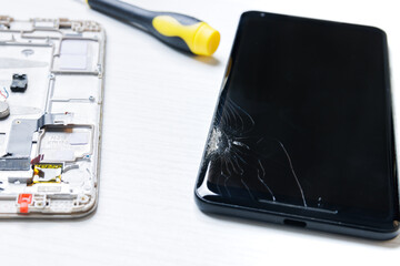 Broken mobile phone screen repair. Smartphone screen