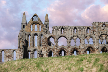 Whitby, Yorkshire, united kingdom, 23, March 2014 iconic Whitby abbey in North Yorkshire side on view - obrazy, fototapety, plakaty