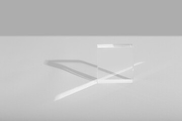 clear glass and plexiglass on a white background with hard light