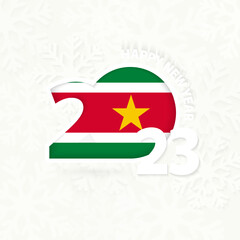 New Year 2023 for Suriname on snowflake background.