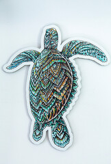 Fototapeta premium Wooden puzzle for children and adults on a white background. View from above. vertical orientation