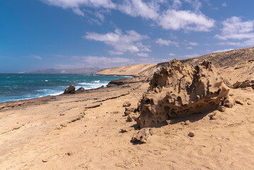 Dry desert coastline with many rock formations, Fuerteventura west coast, Spain