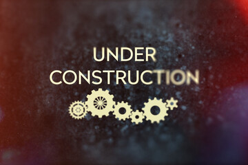 Under construction title, grunge style with grain and partial blur. Black and yellow color scheme with lens flare. Modern typography with gear wheels. - 548867493