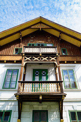 a beautiful traditional house with wooden ornaments und details in Schladming in the Austrian Alps, Austria