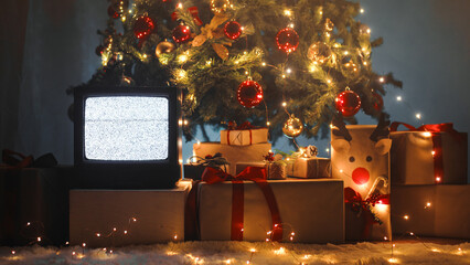 Vintage television under Christmas tree
