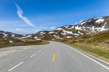 Naklejka premium Mountain pass road Strandavatnet through the highlands of Norway