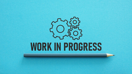 Work in progress is shown using the text and picture of gears