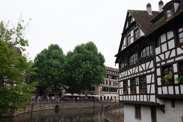 Colored houses in a French village along a canal in the Alsace area