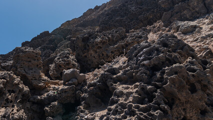 Huge black stones forming rocky desert coast, Canary Islands