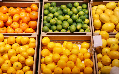  buying vegetables(  orange, lemon) at the market