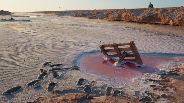 Medium shot of water remains of large endorheic salt lake Chott el Djerid in Tunis. Deserted lake because of weather arid conditions