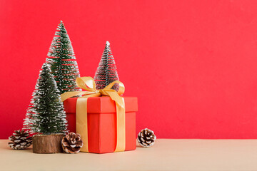 Christmas composition. craft Gift box, small tree, branches and craft DIY decorations on white background. New year concept. Christmas home decoration Flat lay, top view, copy space