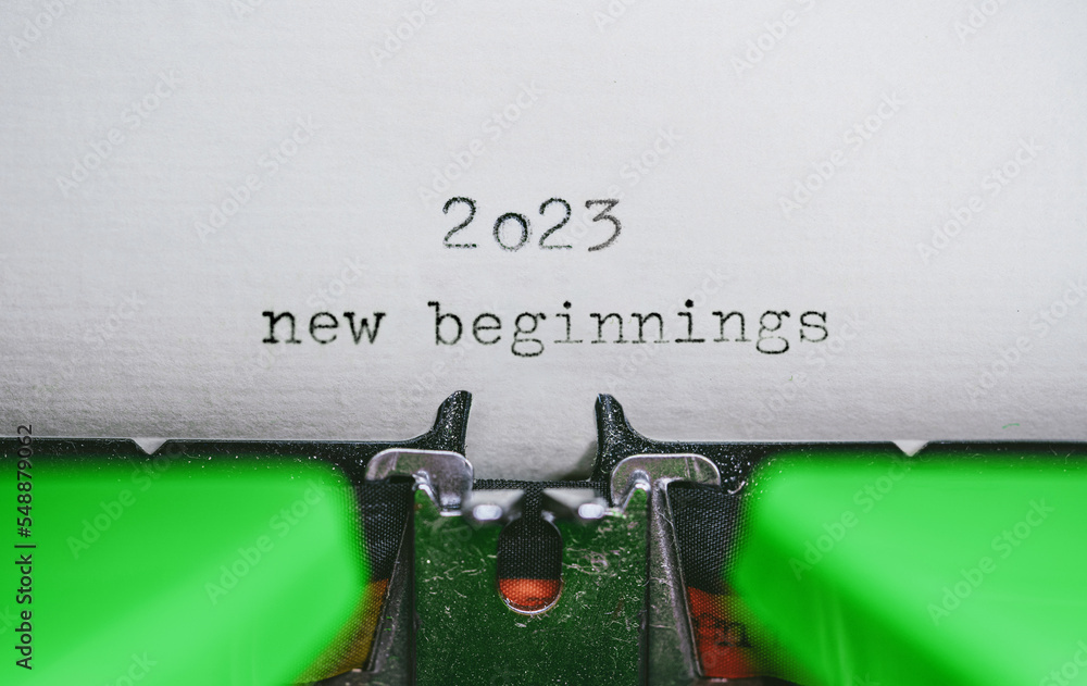 Poster old typewriter with following text on paper - 2023 chapter one. new years concept