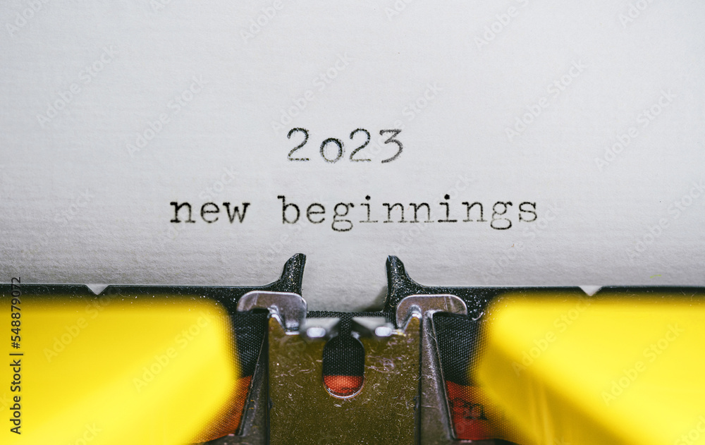 Poster old typewriter with following text on paper - 2023 chapter one. new years concept