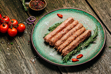 Fresh Raw Beef Minced Meat on a wooden board. Food recipe background. Close up. top view. place for text