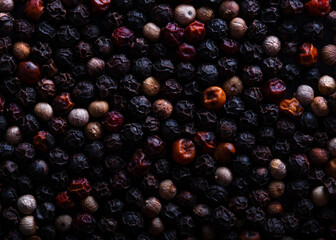 red, black and white pepper close up