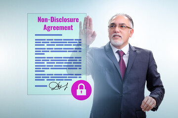 Businessman in non disclosure agreement concept