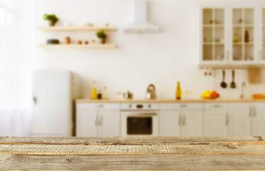 Wood table shelf on blur cooking kitchen background.For montage product display or design key visual layout.Kitchen and cooking concept.View of copy space.