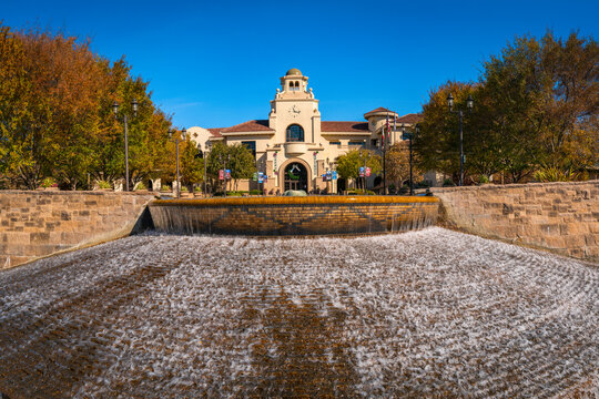 Temecula City Hall building over water fountain with Christmas Greetings on a bright sunny autumn day with blue sky in Southern California, USA
