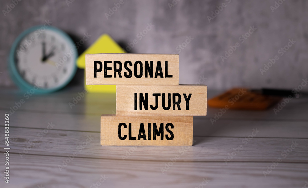 Poster notebook with tools and notes with text personal injury claims