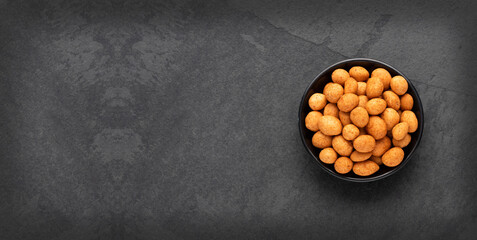 Organic Japanese peanuts in the bowl - Arachis hypogaea