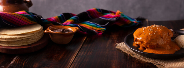 Encacahuatado. Mexican mole made from peanuts, dried chilies, sesame seeds, tomatoes and other...