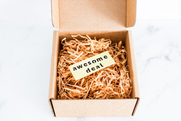 promotions and shopping over the festive season, parcel or gift box with Awesome Deal label