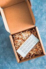 online shopping and shipping over the festive season, parcel or gift box with Deliveries label