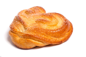 Isolated sweet bun, heart shaped on white background