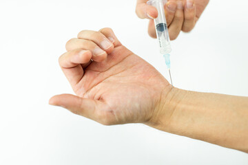 A syringe for injecting drugs into a person