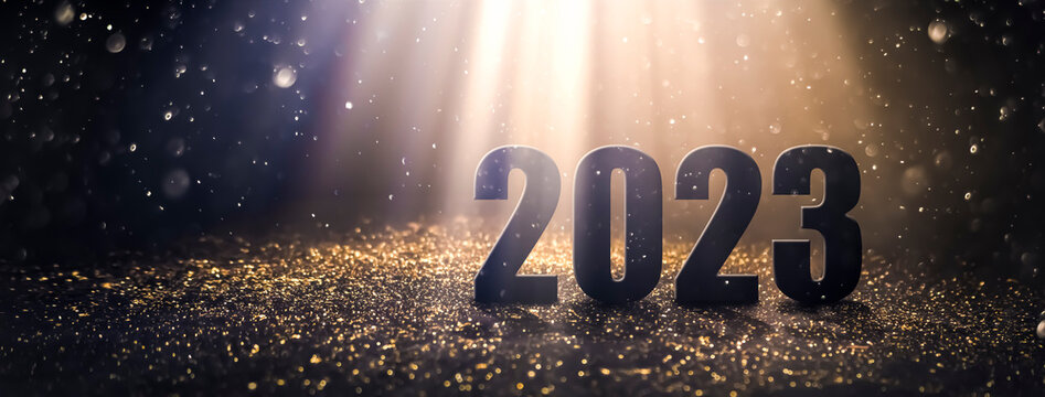 new year 2023 on a beautiful blurred background of dust particles and sparkles